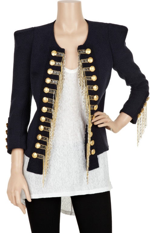 BALMAIN JACKET

With bold structured shoulders and gold military decoration, Balmain's instantly recognizable navy trophy jacket is a sensational investment piece! Combat tried-and-true cocktail threads by teaming Balmain's silk-blend bouclé jacket