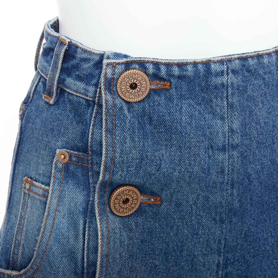 BALMAIN blue washed bronze coin button high waisted denim shorts FR36 S
Reference: AAWC/A01327
Brand: Balmain
Designer: Olivier Rousteing
Material: Cotton
Color: Blue, Bronze
Pattern: Solid
Closure: Button
Extra Details: Vintage-effect denim shorts