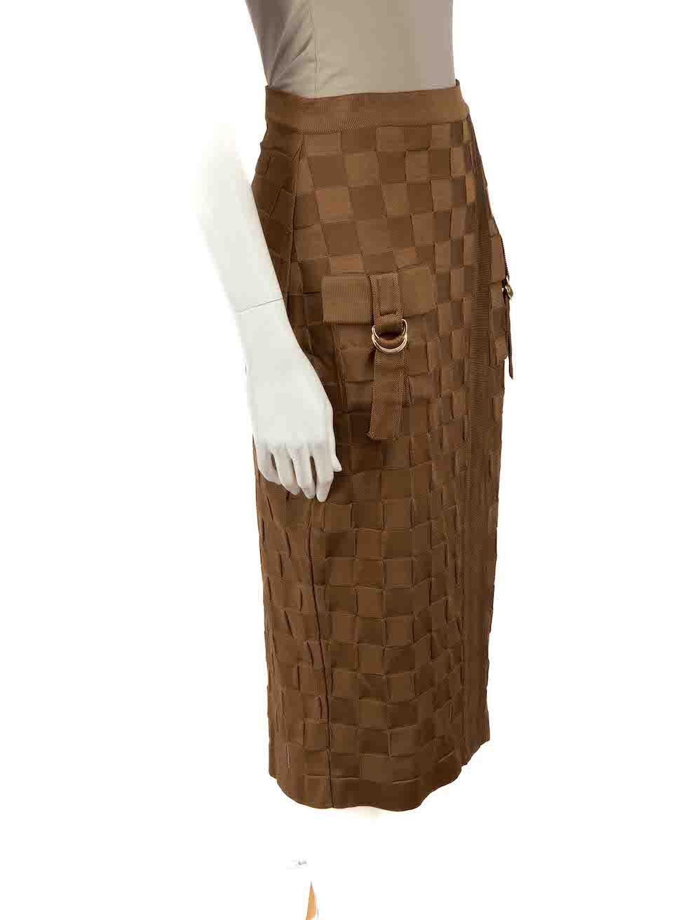 CONDITION is Very good. Hardly any visible wear to skirt is evident on this used Balmain designer resale item.
 
 
 
 Details
 
 
 Brown
 
 Viscose
 
 Pencil skirt
 
 Woven pattern
 
 2x Front pockets
 
 Midi
 
 Back zip fastening
 
 
 
 
 
 Made in