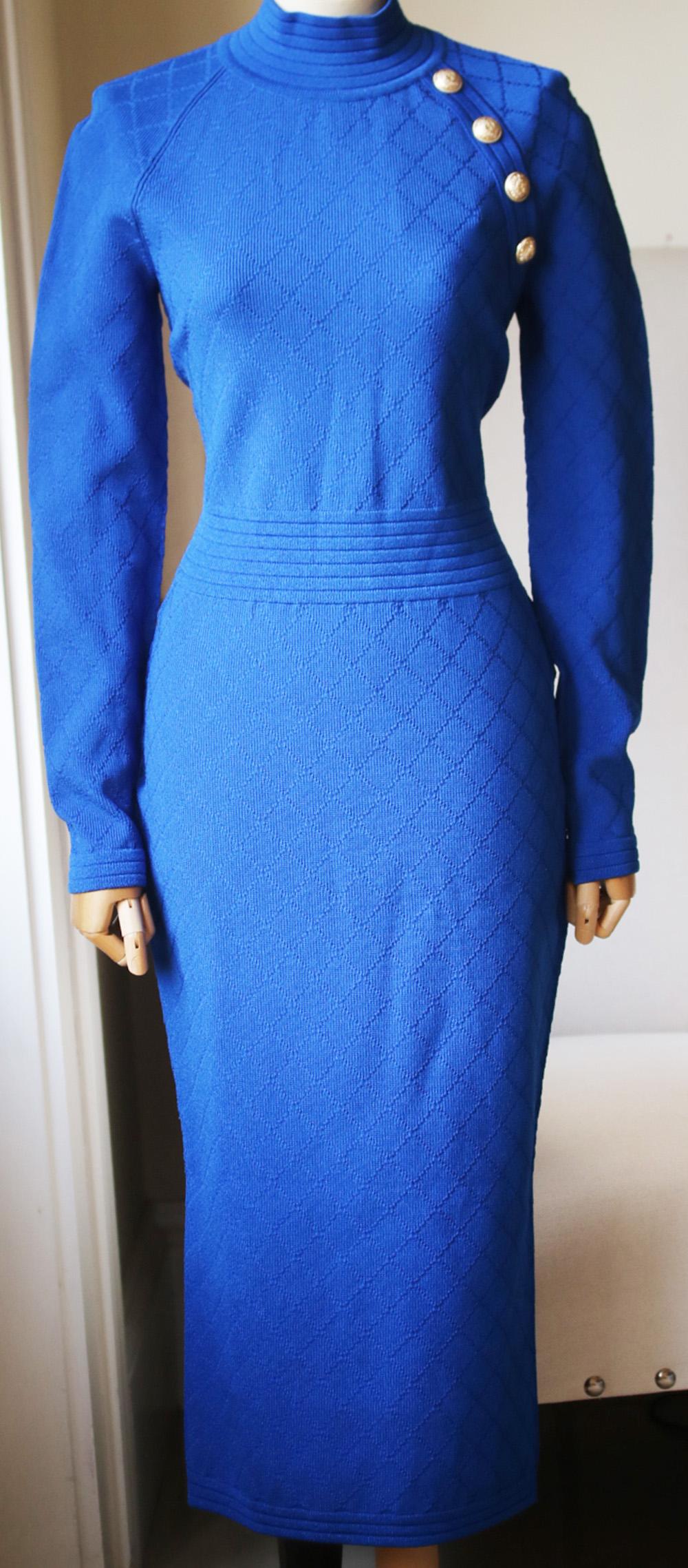Balmain's turtleneck midi dress will make a bold statement at your next important meeting or dinner date thanks to the mood-boosting cobalt hue. This slim-fitting style is made from the sculpting jacquard-knit and has a ribbed band at the waist to