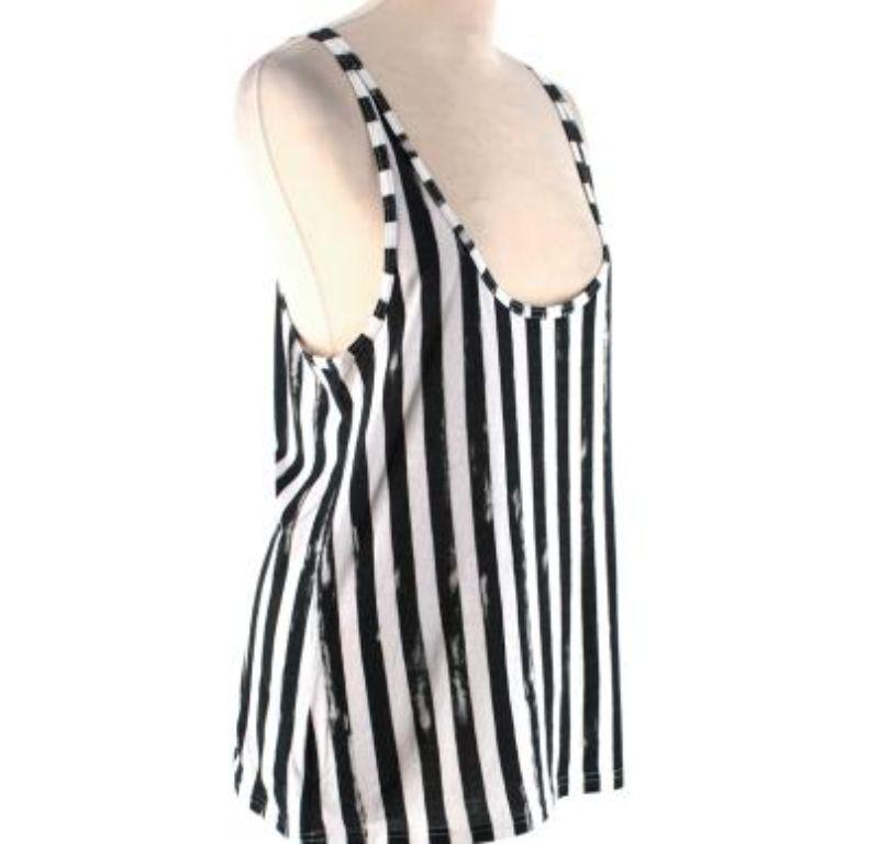 Balmain Cotton Jersey Striped Tank Top

- Made of soft cotton jersey 
- Classic tank cut 
- Round neckline 
- Striped print 
- Bleach like details to the print 
- Dark green and white hues
- Comfortable Timeless design 

Materials:
100% cotton