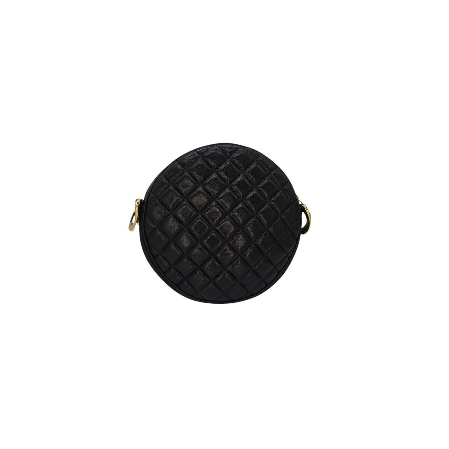 Elevate your style with the Balmain Disco Logo Quilted Leather Round Crossbody. Crafted in Italy from diamond quilted leather, this statement piece features a bold round shape and a thick, adjustable crossbody strap for a touch of elegance. The zip