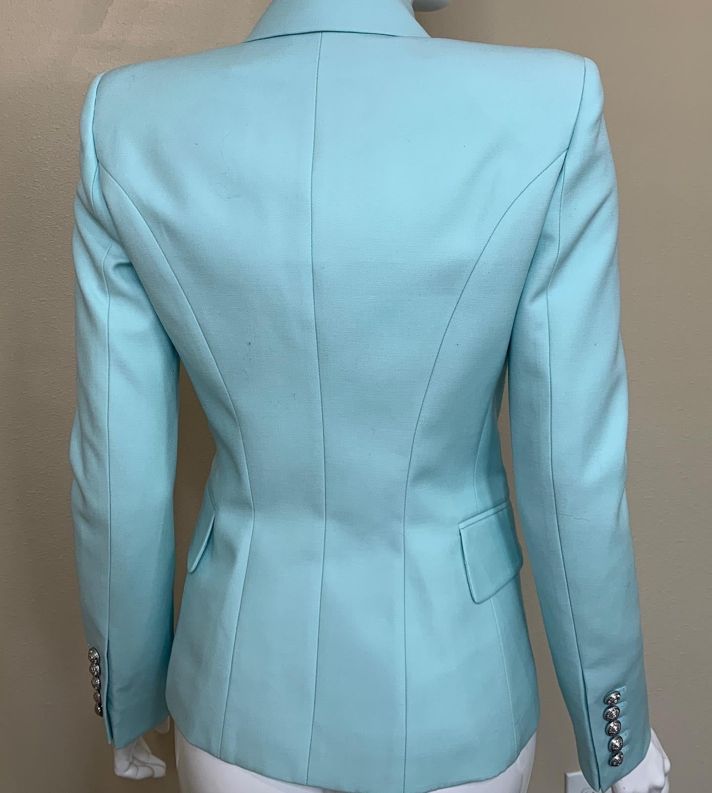 The Classic Balmain Blazer. This one is a beautiful baby blue with silver buttons. 
Tags are still on - never worn. Size 36. 

Retails for $2295

 