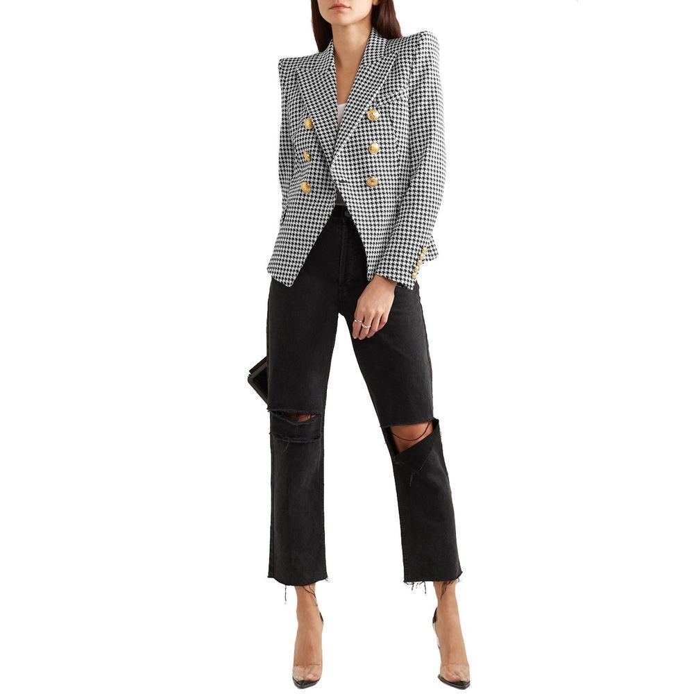 Cut from cotton-blend jacquard and patterned with black and white houndstooth checks, Balmain's double-breasted version is accentuated with embossed gold buttons. Style it with a camisole and jeans.
Black and white cotton-blend jacquard- Button