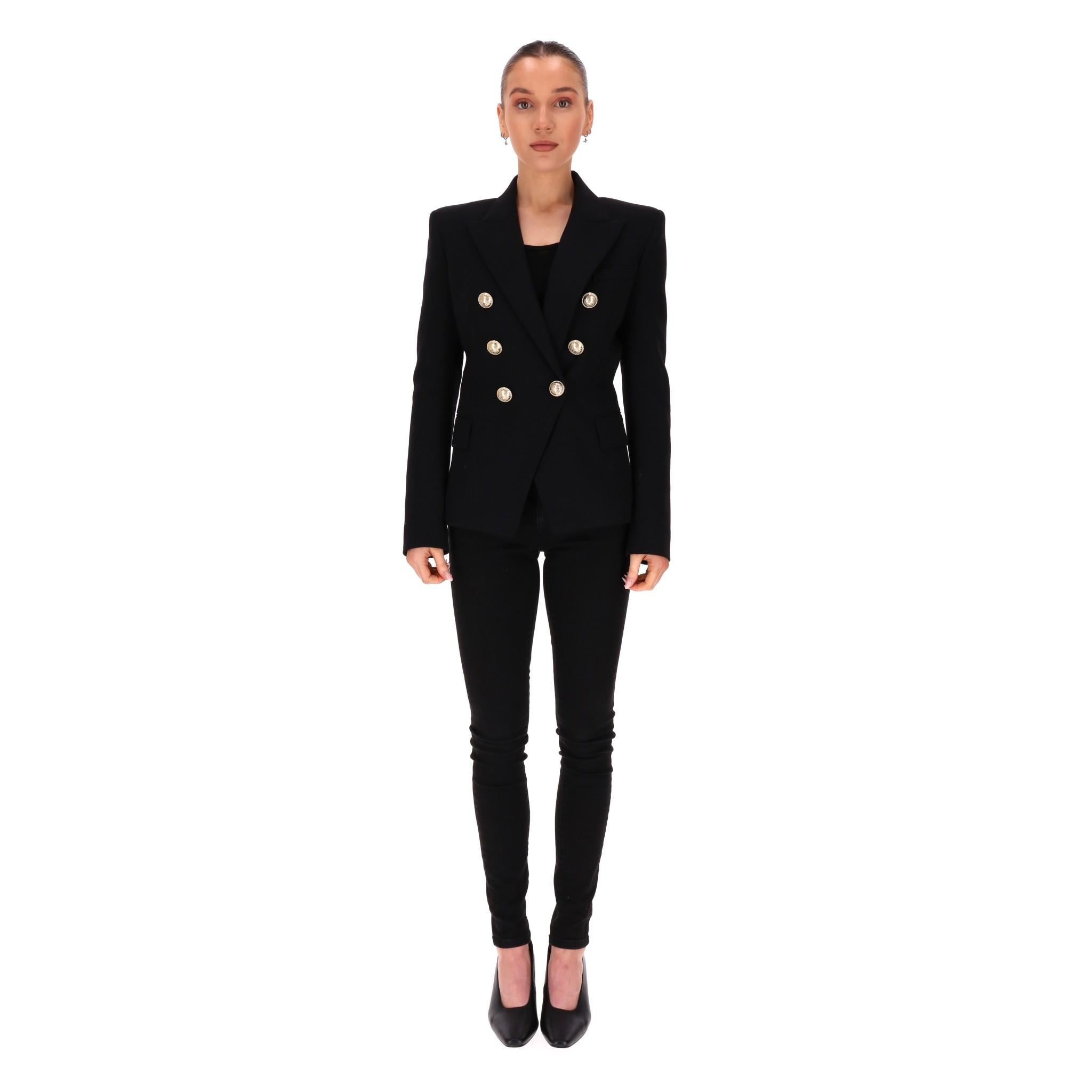 Balmain Double-Breasted Wool Jacket

Black blazer fully crafted from wool in signature double-breasted design.

Featuring iconic logo-embossed gold buttons, fitted silhouette and peak lapels.

Rrp Approx. £2,500

Size – 36FR

Condition – Very Good