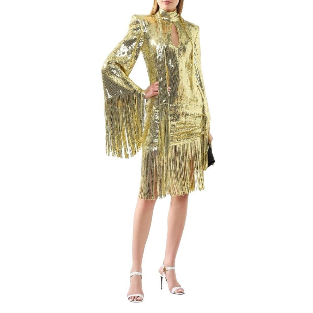 Step out of the car and waltz into your next event with Balmain's eye-catching mini dress. With golden sequins and dazzling fringe, this overly embellished statement piece will carry you through the holiday season effortlessly.
Concealed zip
