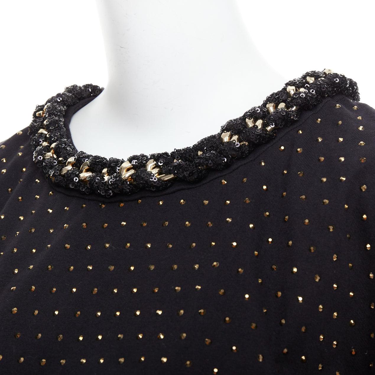 BALMAIN gold crystal rhinestone chain embellished black crop tshirt XS
Reference: AAWC/A01297
Brand: Balmain
Designer: Olivier Rousteing
Material: Cotton
Color: Black, Gold
Pattern: Embellishments
Closure: Hook & Bar
Extra Details: