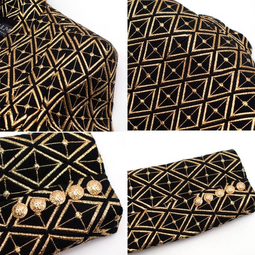 Balmain printed wool blend blazer jacket

Featuring:
-long sleeves
-shoulder pads
-gold tone button cuffs
-lined
-flap pockets
-no fastening
-slanted hem

Size label is missing, however based on the vip seller's usual size and our approximate