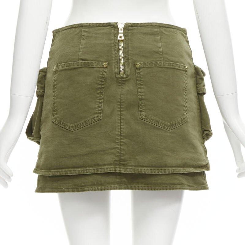 Women's BALMAIN gold tone horsebit buckle green distressed cargo mini skirt FR34 XS For Sale