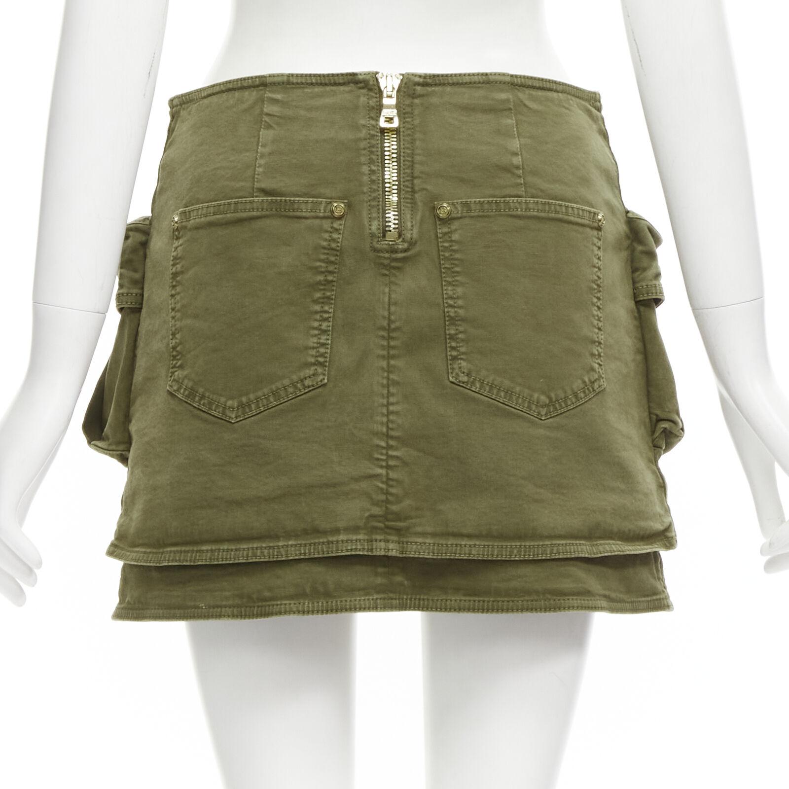 Women's BALMAIN gold tone horsebit buckle green distressed cargo mini skirt FR34 XS For Sale
