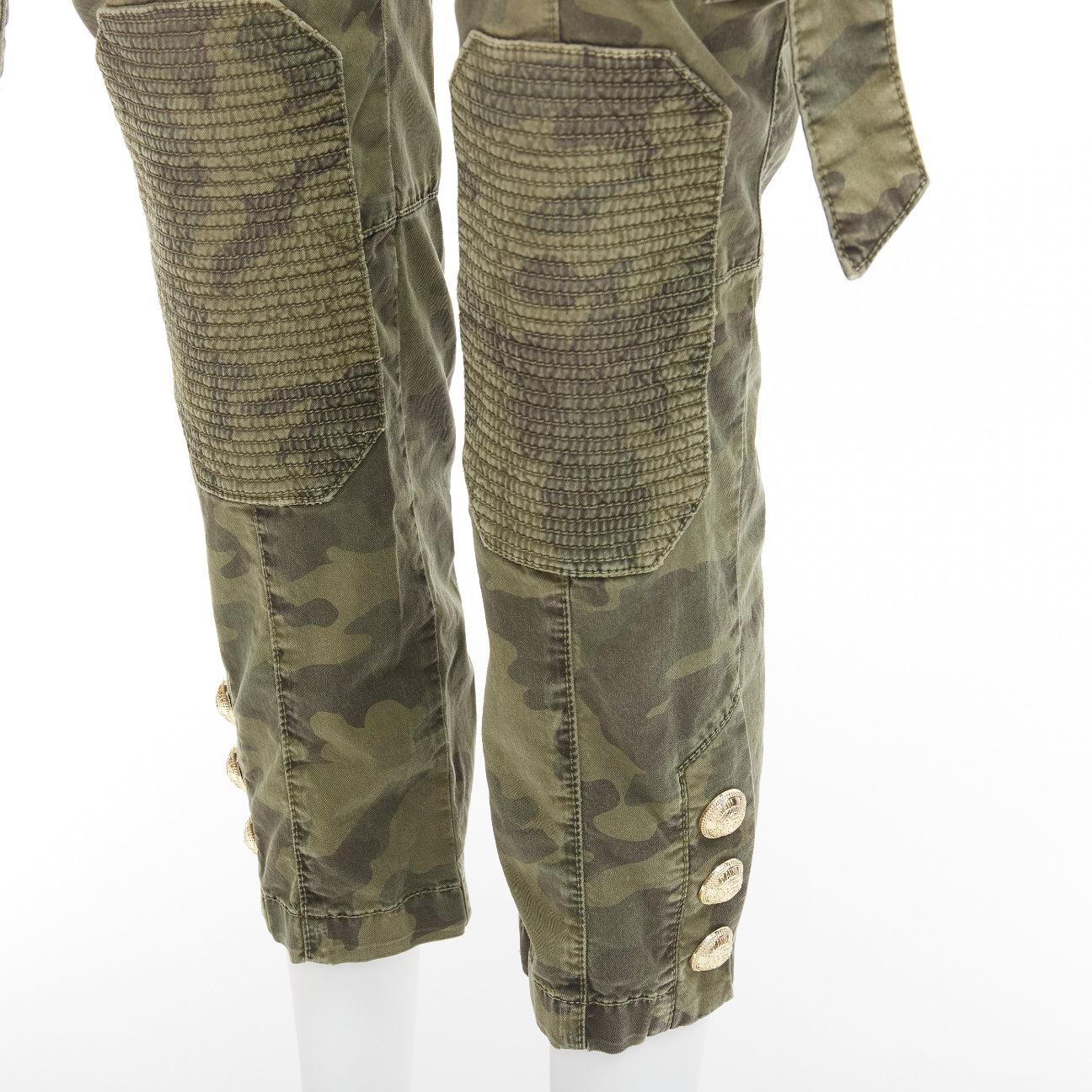 BALMAIN green camo cotton gold hardware mid waist cargo biker pants FR34 XS
Reference: AAWC/A00890
Brand: Balmain
Designer: Olivier Rousteing
Material: Cotton, Blend
Color: Green, Gold
Pattern: Camouflage
Closure: Zip Fly
Extra Details: Bring a