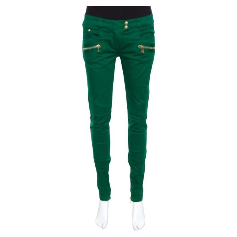 Vaqueros pitillo de denim verde Balmain con panel acanalado y detalle de cremallera S en venta