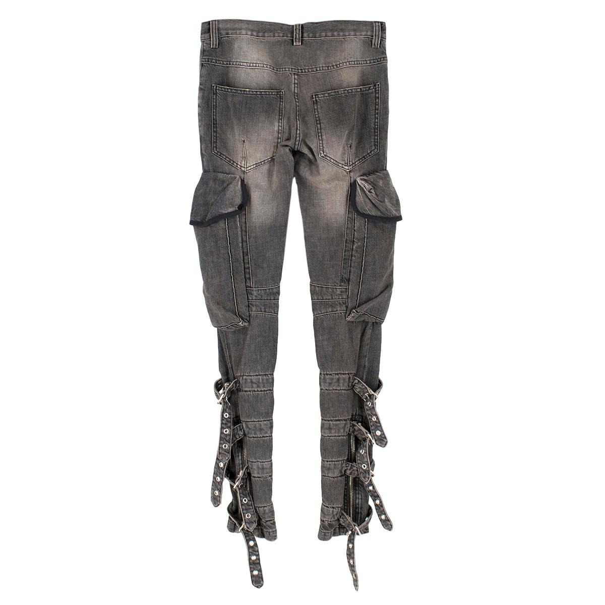 Balmain Cotton Washed Out Grey Belted Hem Jeans

- 100% cotton
- Washed out, grey
- Zip fly and hook and bar fastenings at the waistline
- Two pockets both at the front, side and at the back
- Adjustable metal buckle strap and zip fastening at the
