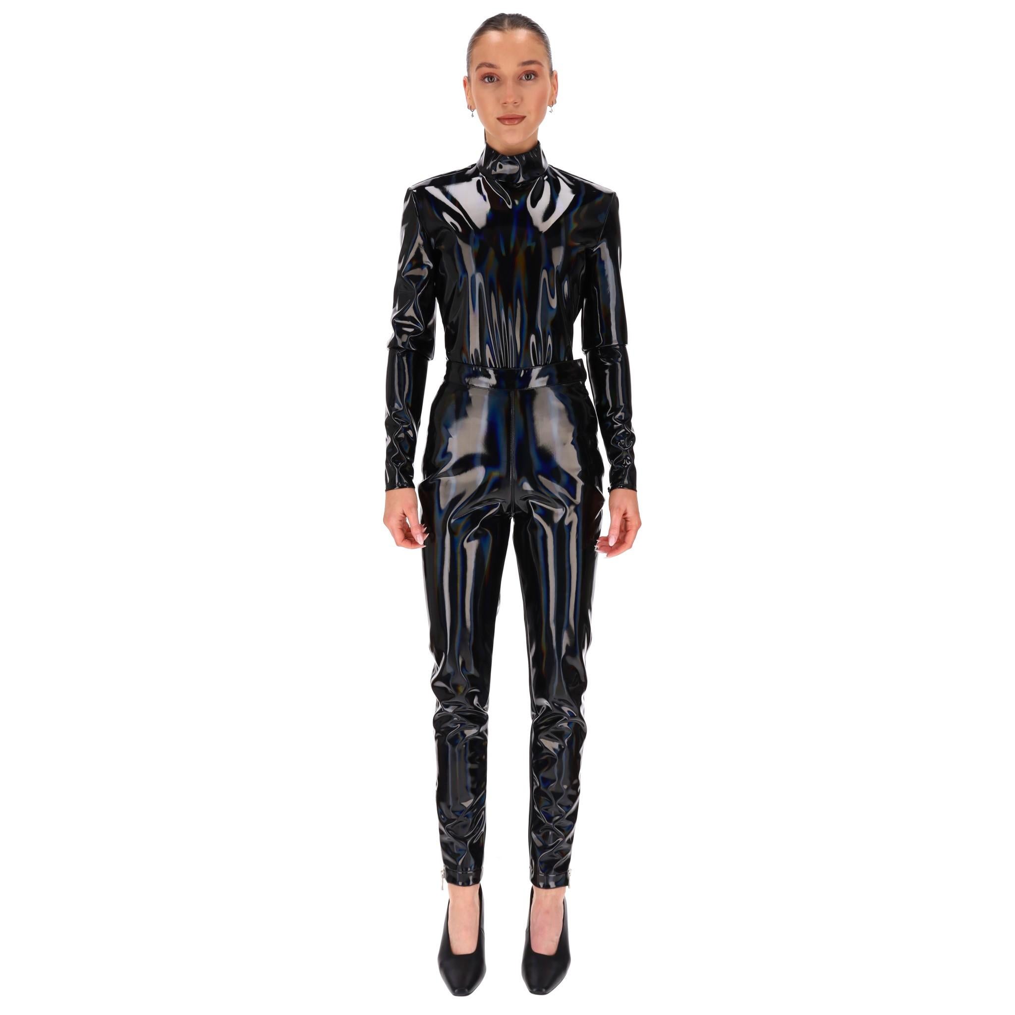 Brand New - Balmain Iridescent Vinyl Two-Piece Set

Black iridescent bodysuit and trousers crafted from stretchy vinyl.

The top features a turtleneck collar, long sleeves and zip closure to rear.

Slim-fit trousers designed with zipped cuffs and