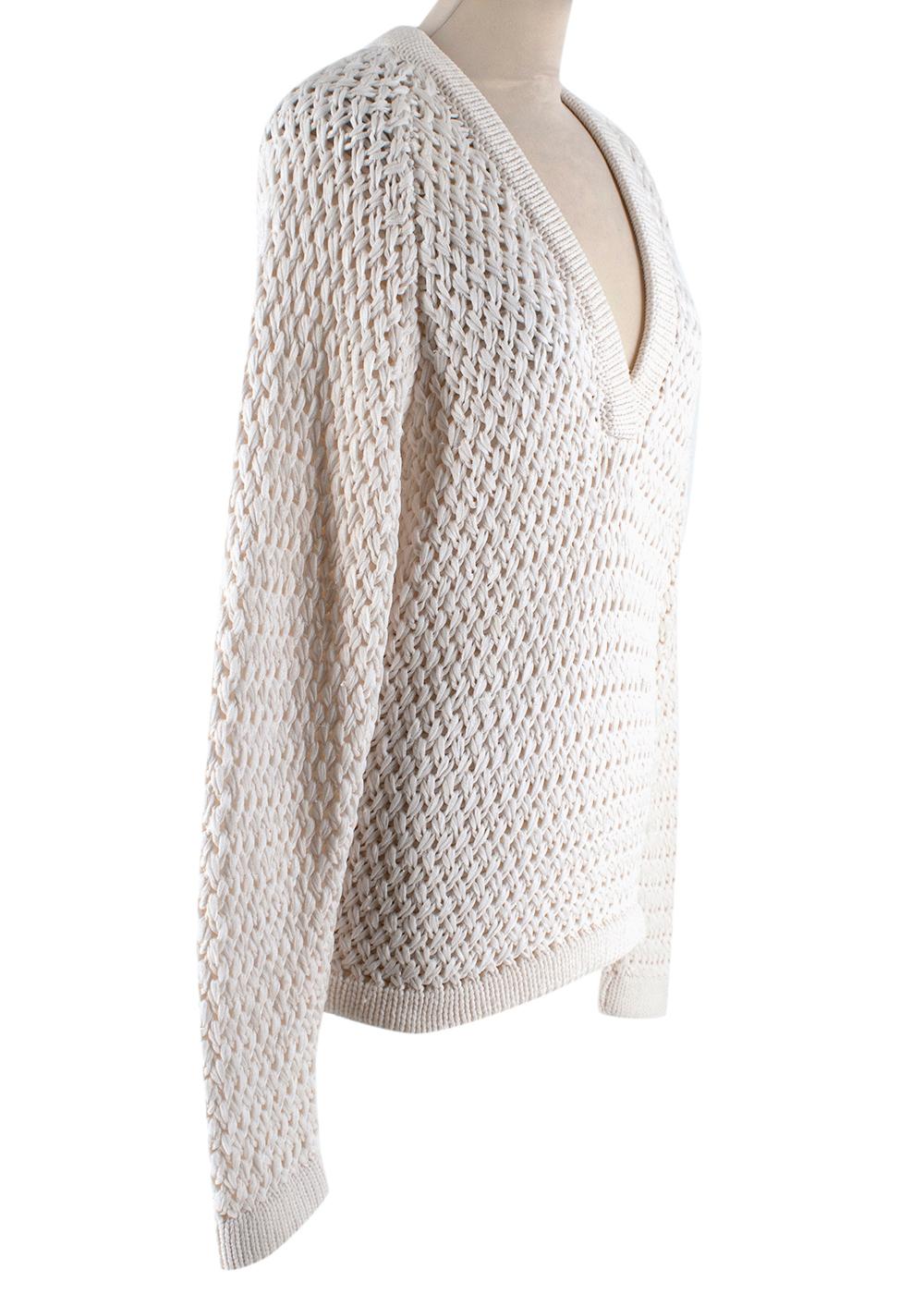 Balmain Ivory Glitter Chunky Knit Jumper

- Chunky sheer cable knit with cream silk glittery woven twills
- V cross-over neckline with smaller cable knit design
- Mid weight material
- Soft blend of silk

Fabric Composition:
57% Polyamide
43%
