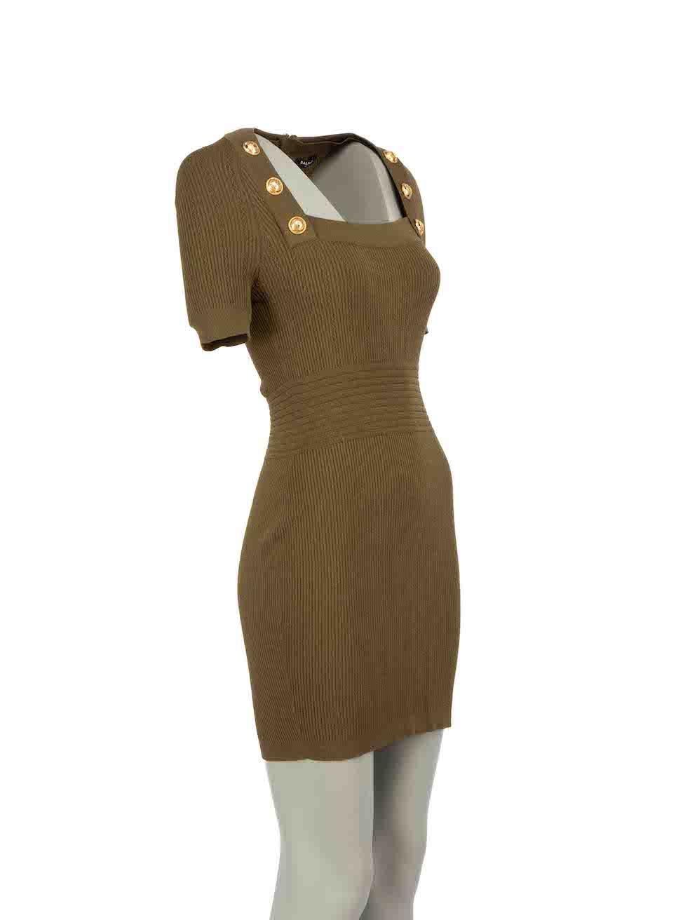 CONDITION is Very good. Minimal wear to dress is evident. Minimal wear to the rear and lining with pulls to the knit. Stains is evident to the rear neckline on this used Balmain designer resale item.
 
Details
Khaki
Viscose
Mini dress
Knitted and