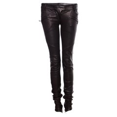 Balmain, leather biker trousers in black.
