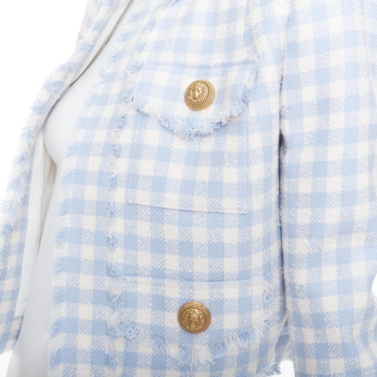 Balmain giacca cropped 4 tasche in tweed a quadri bianchi e blu chiaro FR34 XS
Riferimento: AAWC/A01435
Marchio: Balmain
Designer: Olivier Rousteing
Materiale: Cotone, misto
Colore: Bianco, Blu
Modello: A scacchi
Fodera: Tessuto bianco
Dettagli