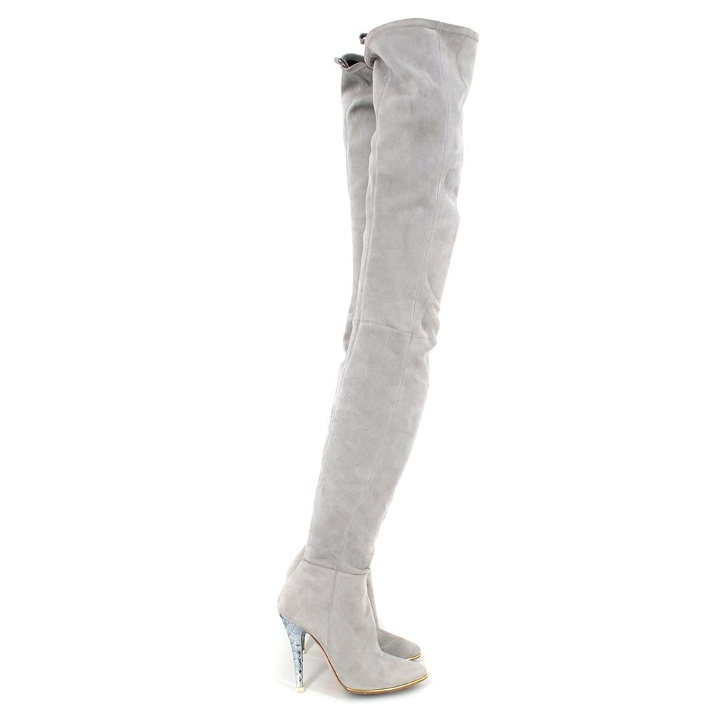 Balmain Light Grey Thigh-high Stretch Heeled Boot. RRP £1590

- Mid to High Stiletto Heel 
- Metallic Scale Heels 
- Gold tone Hardware on Zip and around the toe 
- Pointed Toe  
- Stitching Detail 
- Branded Dust Bag Included

100% Suede Fabric