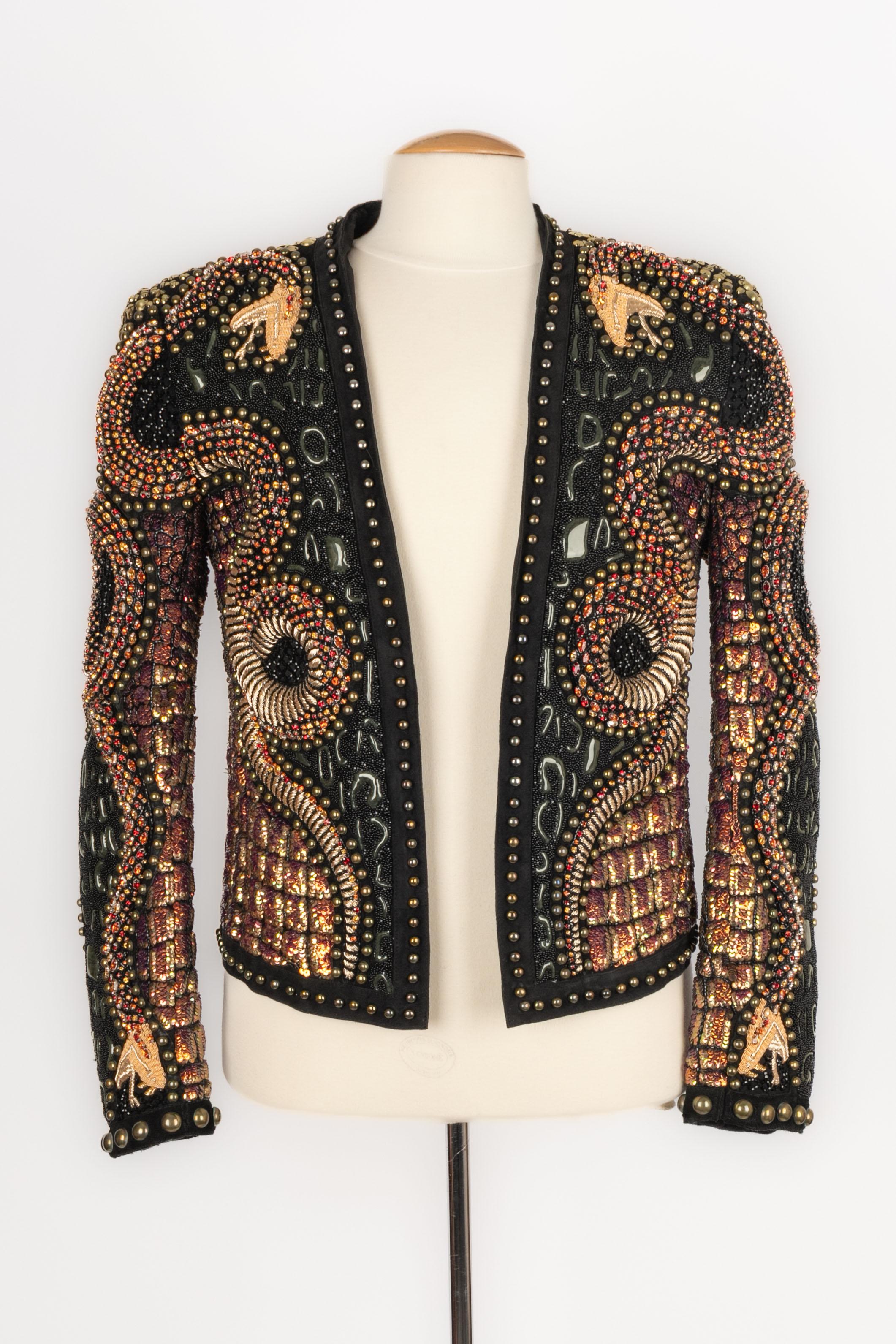 BALMAIN - (Made in India) Man jacket entirely embroidered with a snake pattern made of pearls, sequins, and golden lurex threads. Size 48FR indicated. 2017 Fall-Winter Collection under the artistic direction of Olivier Rousteing.

Condition:
Very