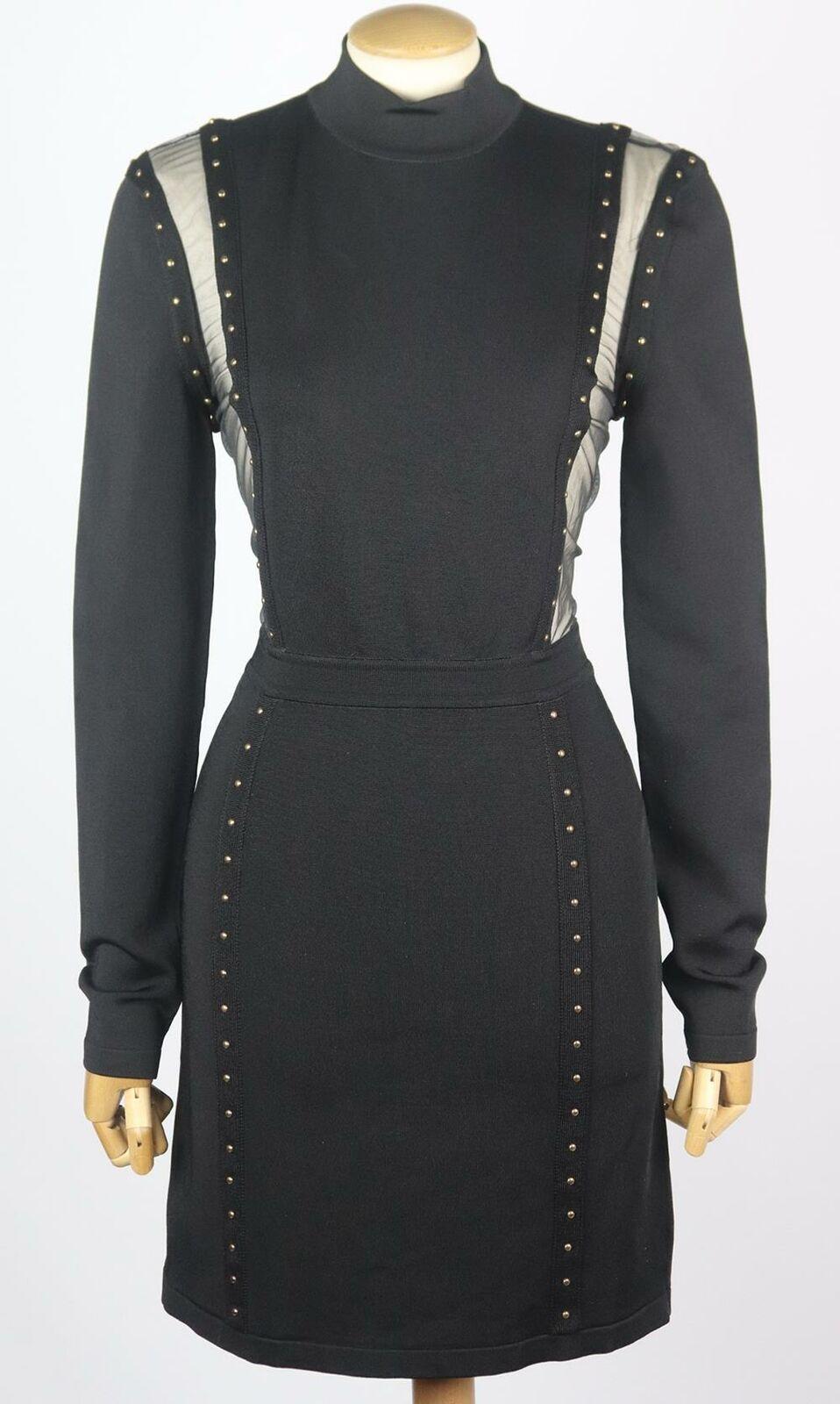 This Balmain dress has been crafted from stretch-knit and is designed with antiqued-gold tone studded detail tracing the sheer mesh panels down each side of your body, it fits for a slim silhouette.
Black stretch-knit.
Zip fastening at back.
91%