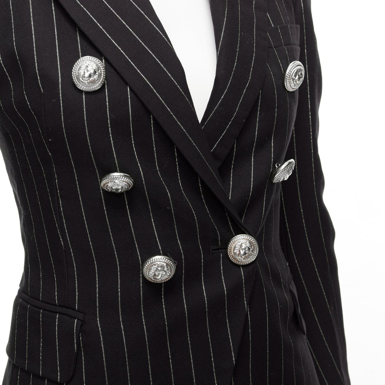BALMAIN metallic gold striped black cotton blend double breasted blazer FR34 XS
Reference: AAWC/A00732
Brand: Balmain
Designer: Olivier Rousteing
Material: Cotton, Blend
Color: Black, Gold
Pattern: Striped
Closure: Button
Lining: Black Fabric
Extra