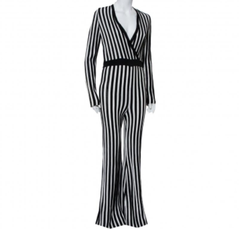 Dress up in this Balmain Jumpsuit to project a chic look. Featuring long sleeves, faux wrap detail, and a monochrome striped look, this impeccably tailored jumpsuit can be complemented with a Balmain blazer.