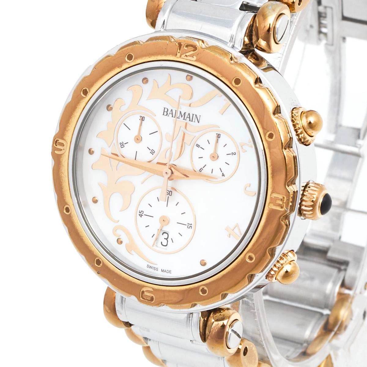 From the Balmania collection of Balmain comes this elegant chronograph watch which is rendered in stainless steel. It has a stylishly carved gold-plated steel bezel that features a round dial detailed with hour markers, three hands, a date window at
