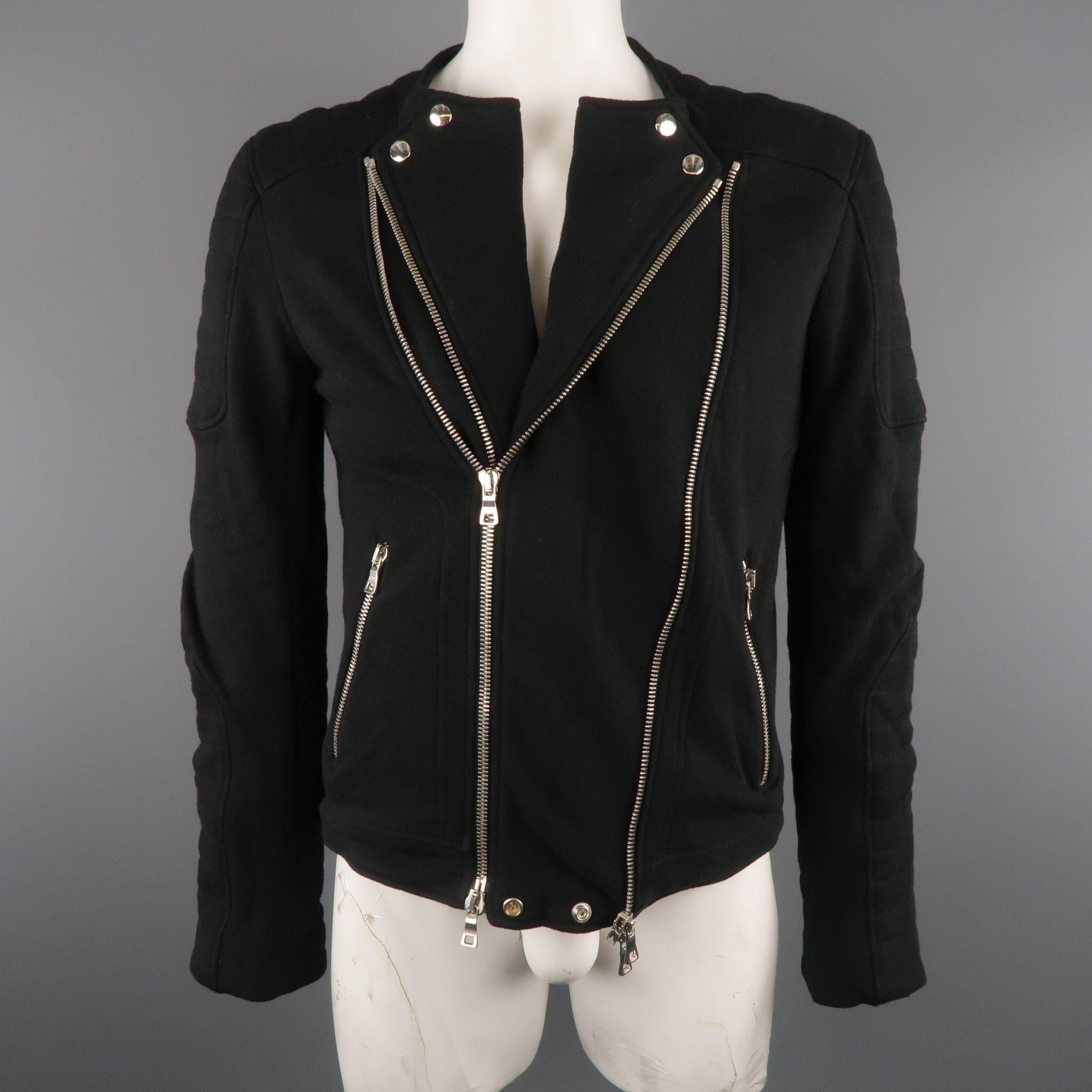 BALMAIN Motorcycle Jacket comes in a black tone in a solid cotton / linen material, with a crewneck, zip and snaps closure, zip pockets and cuffs. Made in Romania.

Excellent Pre-Owned Condition.
Marked: L

Measurements:

l Shoulder: 17.5 in.
l