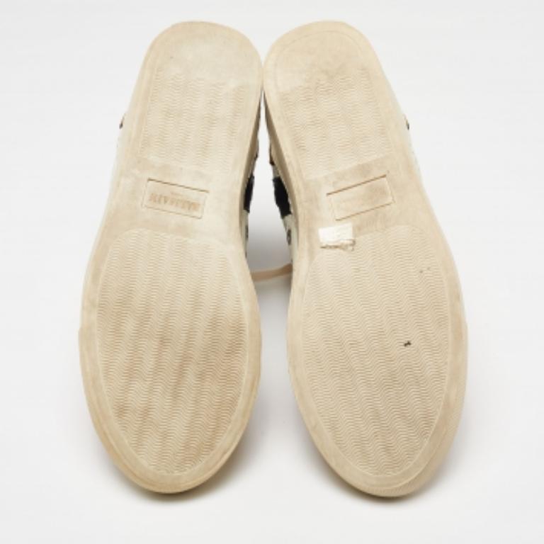 These pre-owned Balmain high-top sneakers for men come crafted from leather, suede and canvas. Perforated details, simple lace-ups, and durable soles make these shoes a great pick.