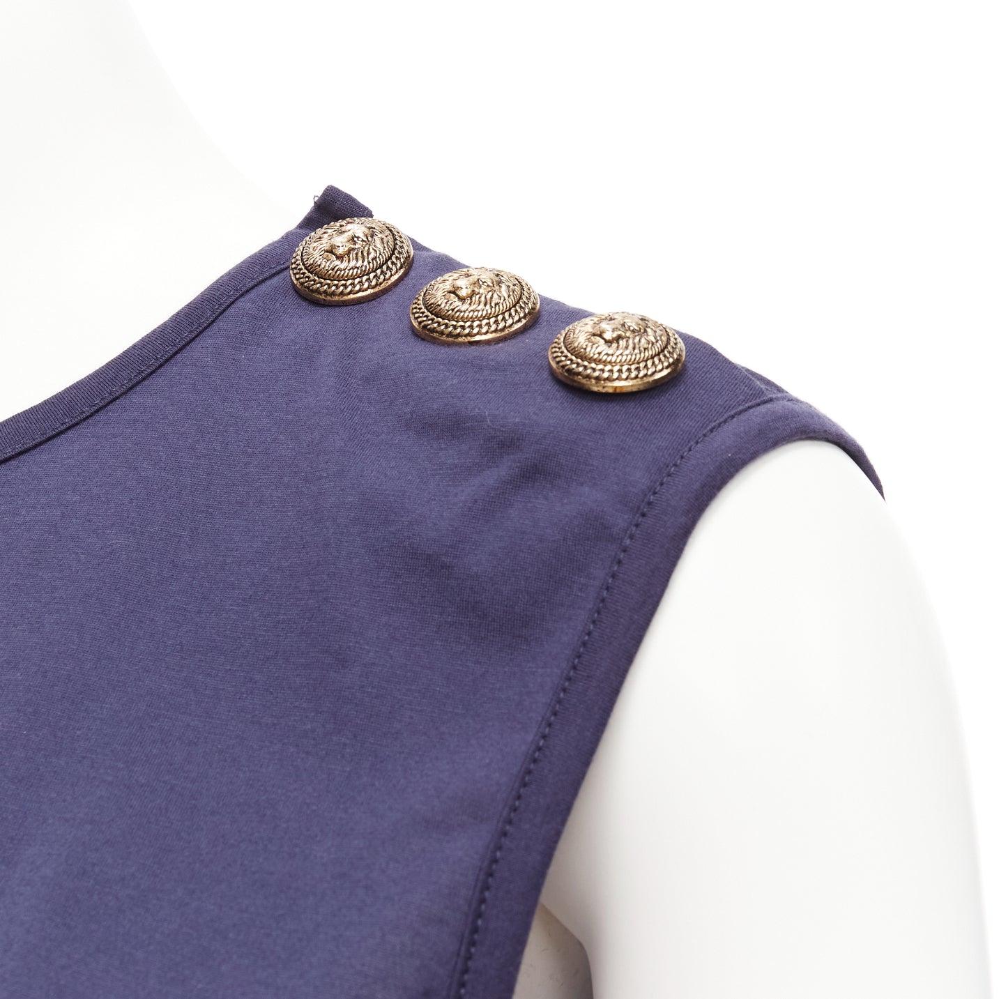 BALMAIN navy gold foil logo military button shoulder tank top FR34 XS
Reference: AAWC/A00764
Brand: Balmain
Designer: Olivier Rousteing
Material: Cotton
Color: Navy, Gold
Pattern: Solid
Closure: Snap Buttons
Extra Details: Snap buttons at