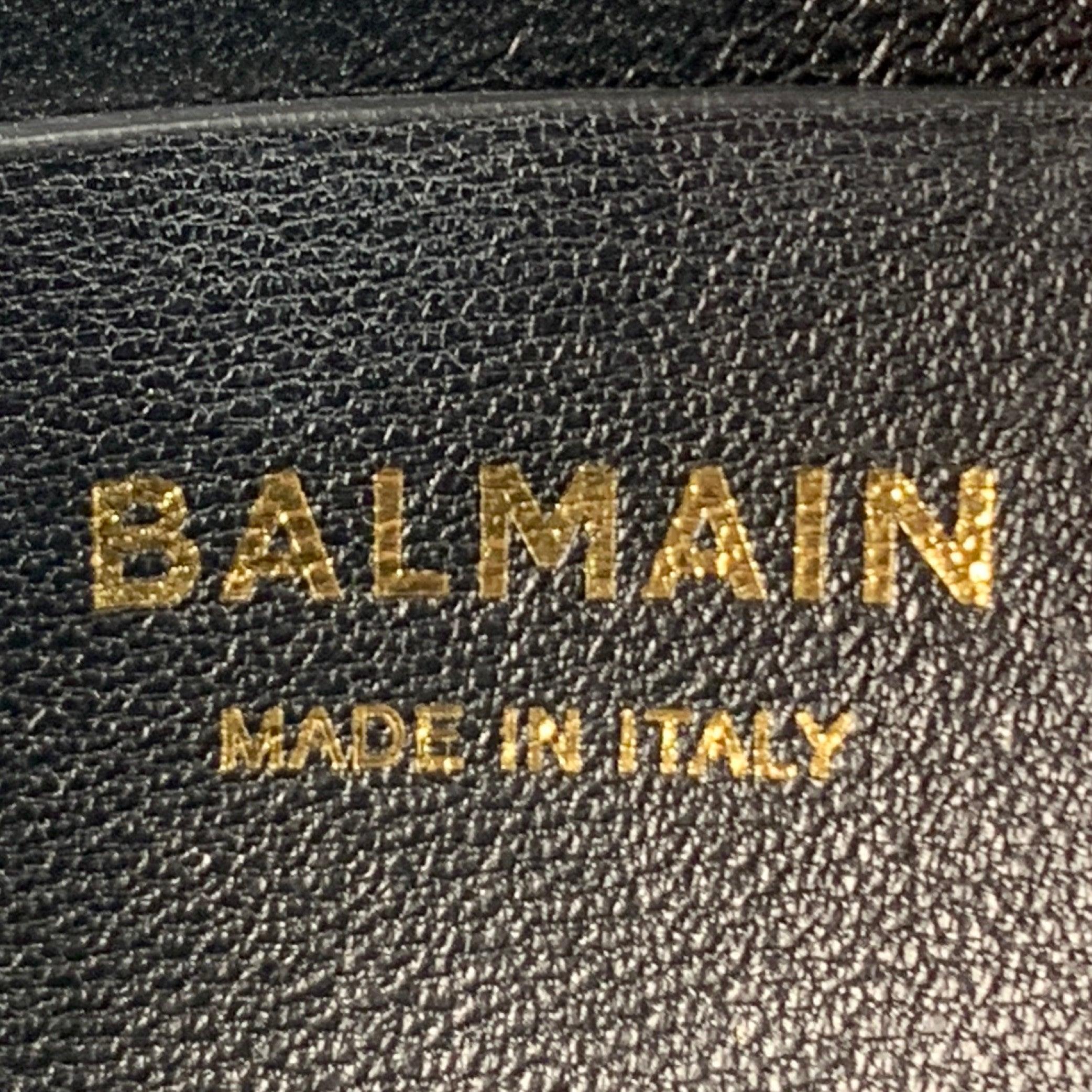 BALMAIN Sac à main en cuir grainé, taille unique, à maillons de chaîne dorés et noirs, en forme de galet en vente 1