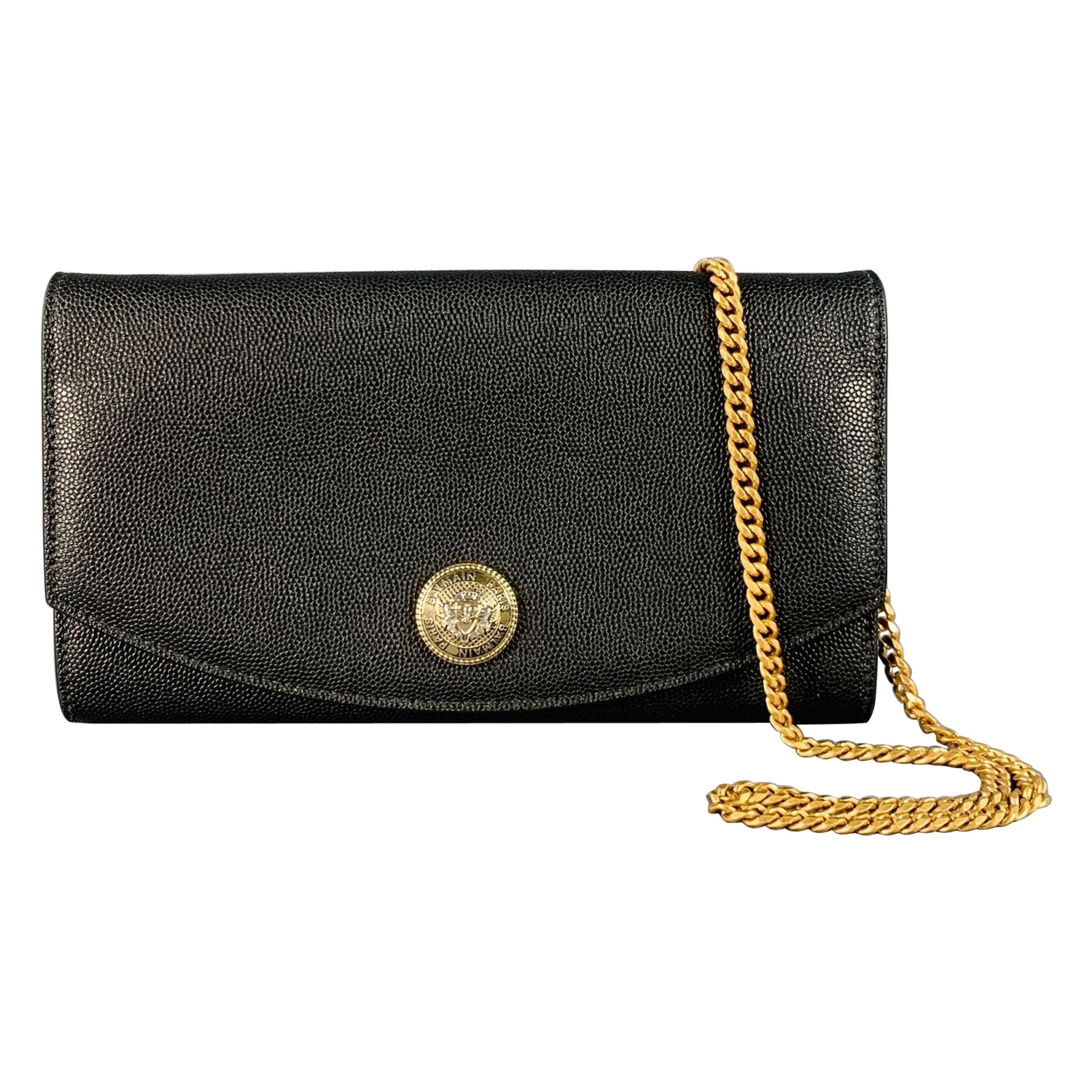 BALMAIN Sac à main en cuir grainé, taille unique, à maillons de chaîne dorés et noirs, en forme de galet en vente