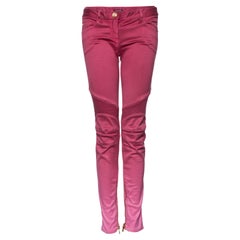Balmain, pink biker jeans with color gradient.