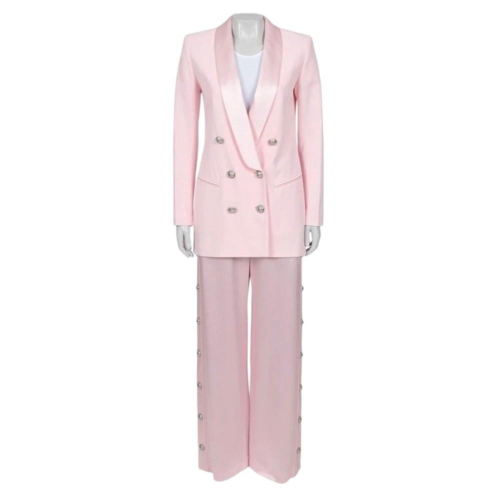 Who makes Balmain suits?