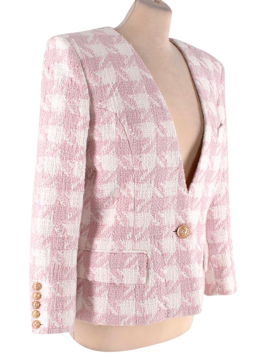 Balmain Pink & White Houndstooth Tweed Collarless Jacket

- Collarless style, with a deep neckline and single button closure
- Large-scale houndstooth weave in pale-pink and white
- Tailored, slightly cropped silhouette with padded shoulder
- Button