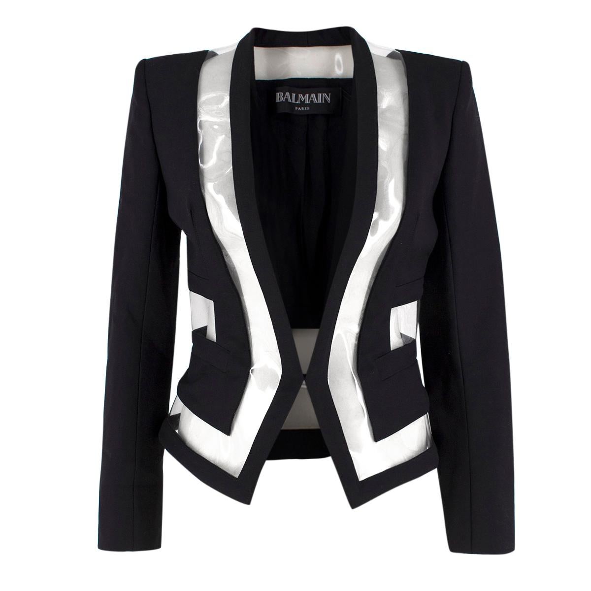 Balmain PVC-insert Wool Blazer

-Black blazer with transparent pvc panels
-Hook and eye closure
-Shoulder pads
-Popper closure on cuffs

Please note, these items are pre-owned and may show signs of being stored even when unworn and unused. This is