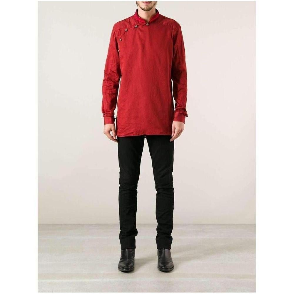 Red cotton shirt from Balmain featuring a grandfather collar, an asymmetric button fastening at the shoulder, long sleeves with button cuffs and a straight hem Composition: Cotton 100% WASHING INSTRUCTIONS : Machine Wash Brand Style ID : T117C284B  