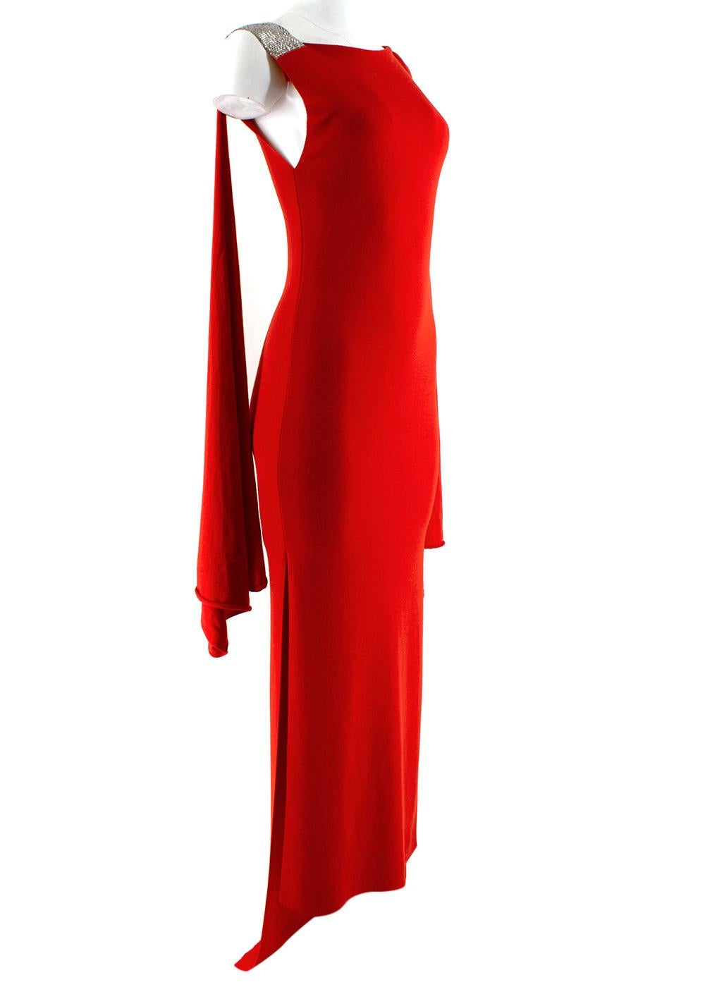 Balmain Red Knit Draped Shoulder Gown

- Straight fit knitted design 
- Stretch knit 
- Silver chain shoulder embellishment 
- Draped shoulder detailing 
- Lower back hem 
- Split side seams 

Materials
100% Wool 

Dry clean only 

Made in France