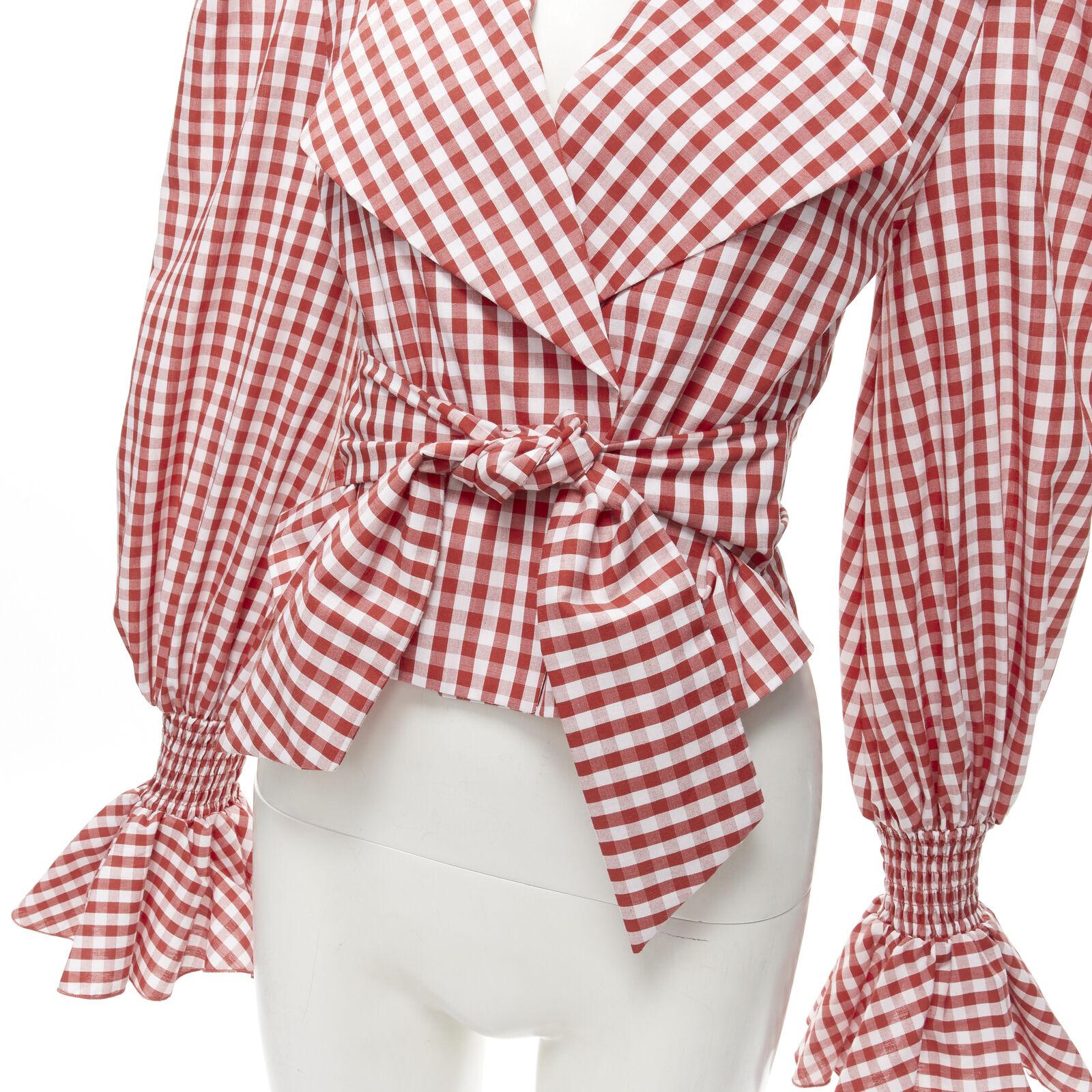 BALMAIN red white gingham cotton tie belt bishop sleeves cottage top FR34 XS
Reference: AAWC/A00277
Brand: Balmain
Designer: Olivier Rousteing
Material: Cotton
Color: Red, White
Pattern: Plaid
Closure: Self Tie
Made in: