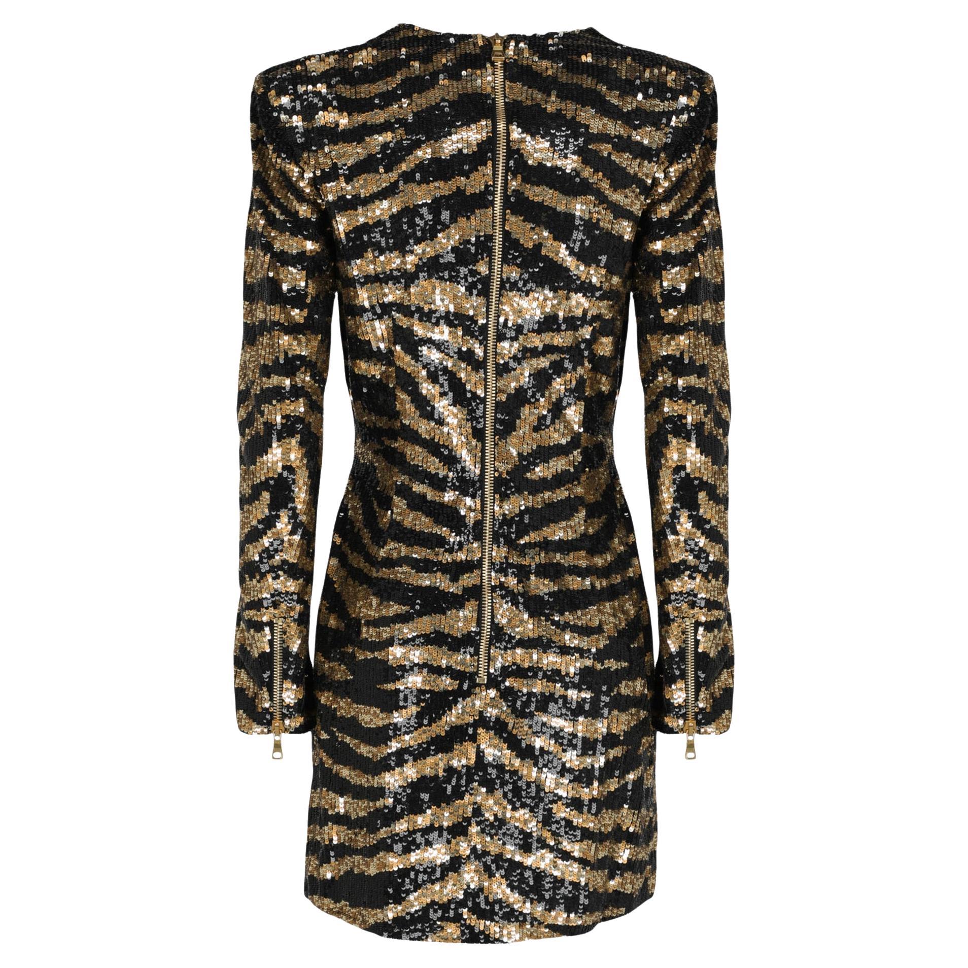 Balmain 
Sequined Tiger-Stripe Mini Dress, Black/Gold from celebrity closet!

Plunging V neckline
Long sleeves
Nips at natural waist
Straight mini skirt and hem
Exposed back zip


FR Size 36 - US S
Made in France


Brand new,  with tags!


os