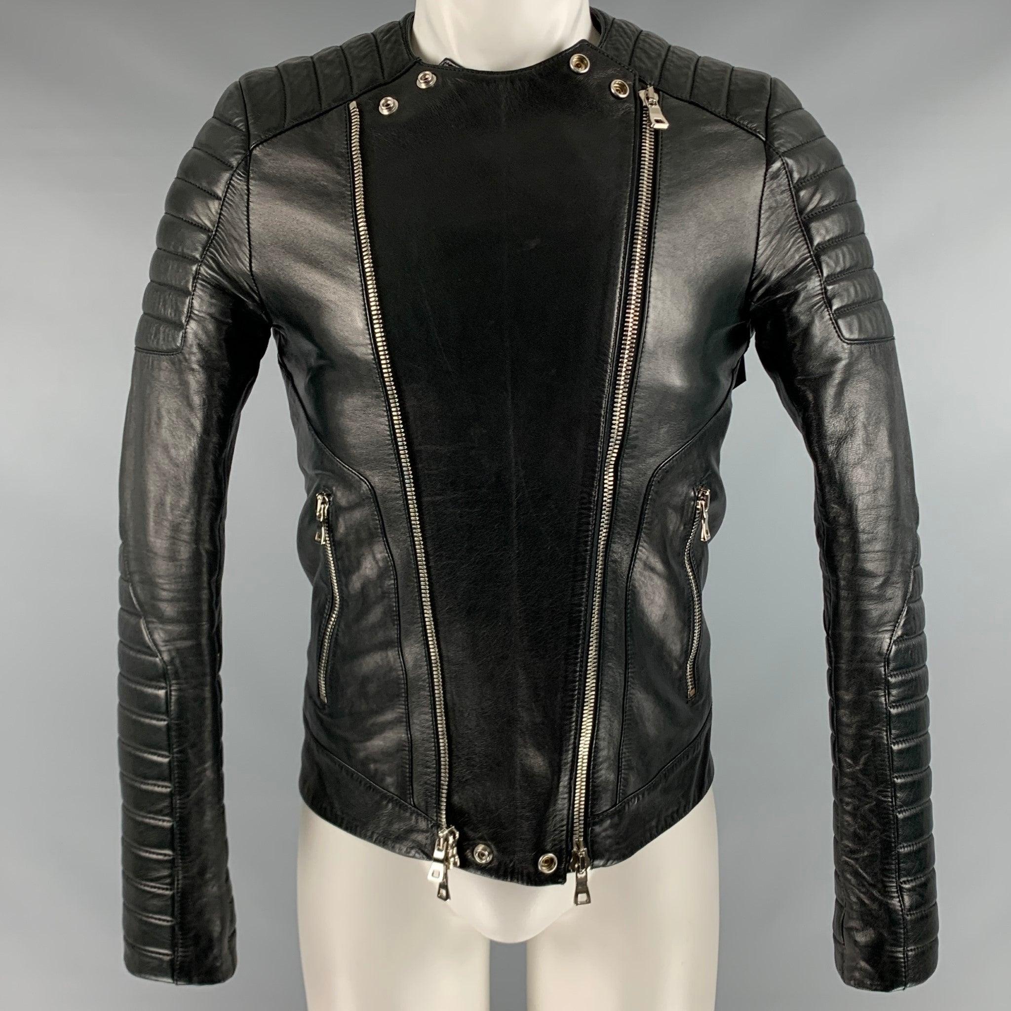 BALMAIN jacket
in a black lambskin leather fabric featuring motorcycle style, quilted sleeves, and an open front double zipper that can be converted to one asymmetrical zipper closure (see photos).Very Good Pre-Owned Condition. Minor signs of wear.
