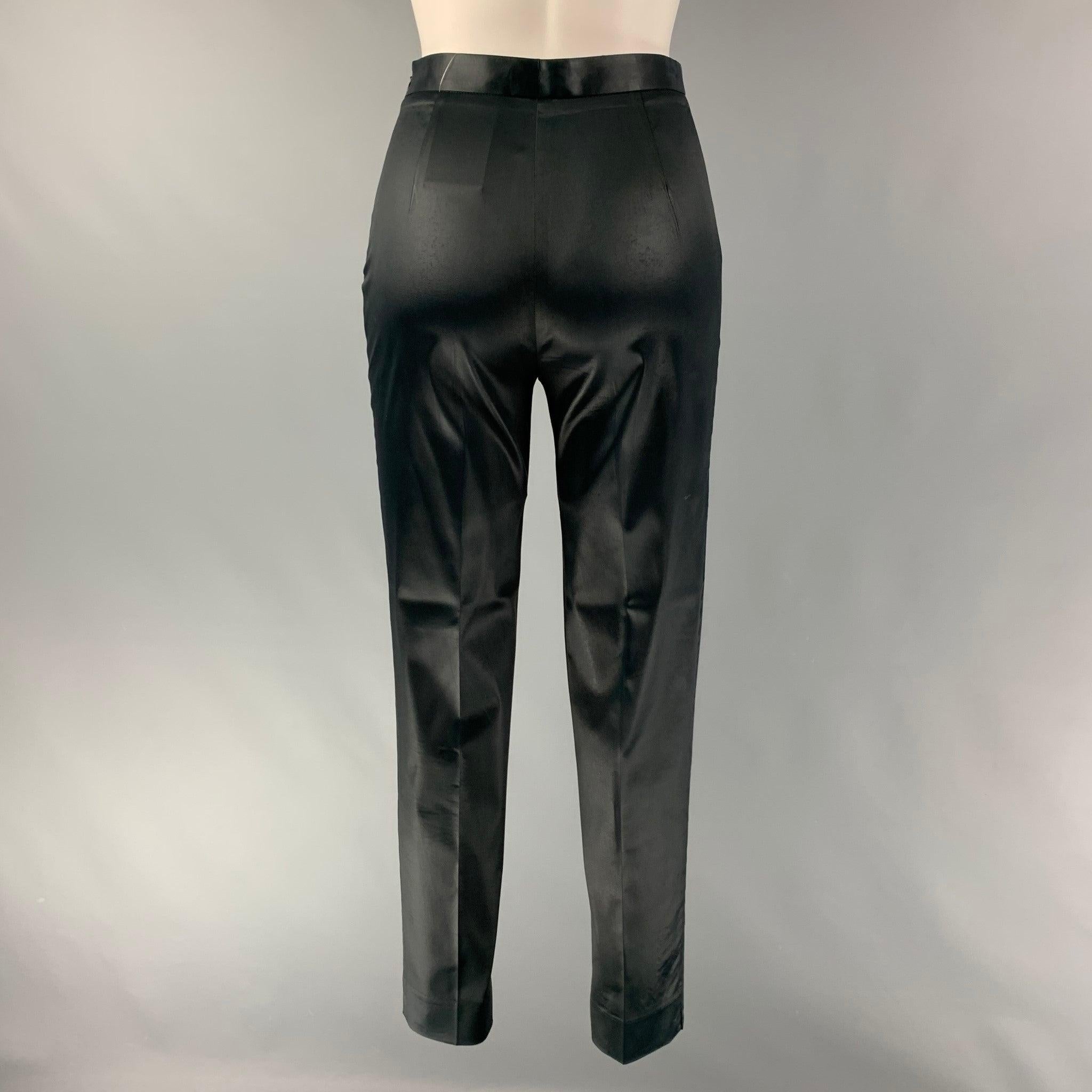 BALMAIN dress pants comes in a black acetate blend featuring a straight leg, invisible side seam zip up closure. Made in Italy.Very Good Pre-Owned Condition. Minor Signs of Wear. 

Marked:   IT 40 

Measurements: 
  Waist: 25 inches Rise: 11 inches