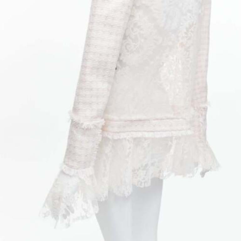 BALMAIN Spencer pink white tweed sheer lace ruffle blazer jacket FR34 XS
Reference: AAWC/A00519
Brand: Balmain
Designer: Olivier Rousteing
Model: Spencer
Material: Lace, Tweed
Color: White, Pink
Pattern: Lace
Closure: Hook & Eye
Lining: Pink