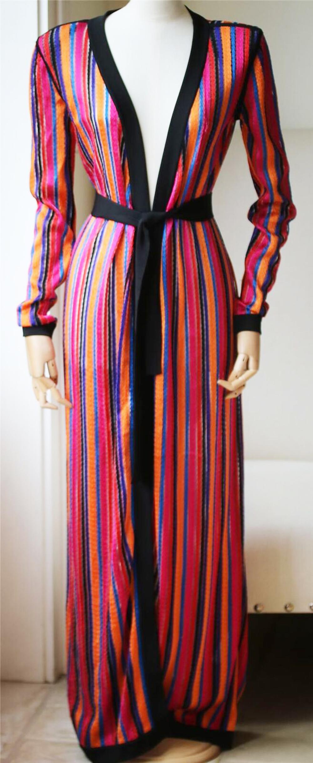 This open-knit design has a floor-length silhouette and is striped in kaleidoscopic hues - Creative Director Olivier Rousteing is inspired by the colors of the sky.
Multicolored open-knit.
Slips on.
94% Viscose, 6% polyamide.
Made in Italy.

Size: