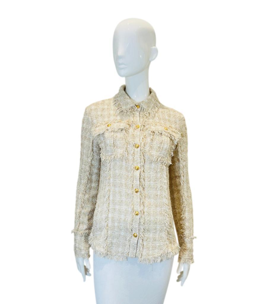 Balmain Tweed Wool Blend Shirt
Ivory shirt crafted in tweed with gold 'Balmain' logo embossed buttons.
Featuring collared neckline, flap chest pockets and buttoned cuffs.
Size – 40IT
Condition – Very Good
Composition – 34% Acrylic, 32% Polyamide,