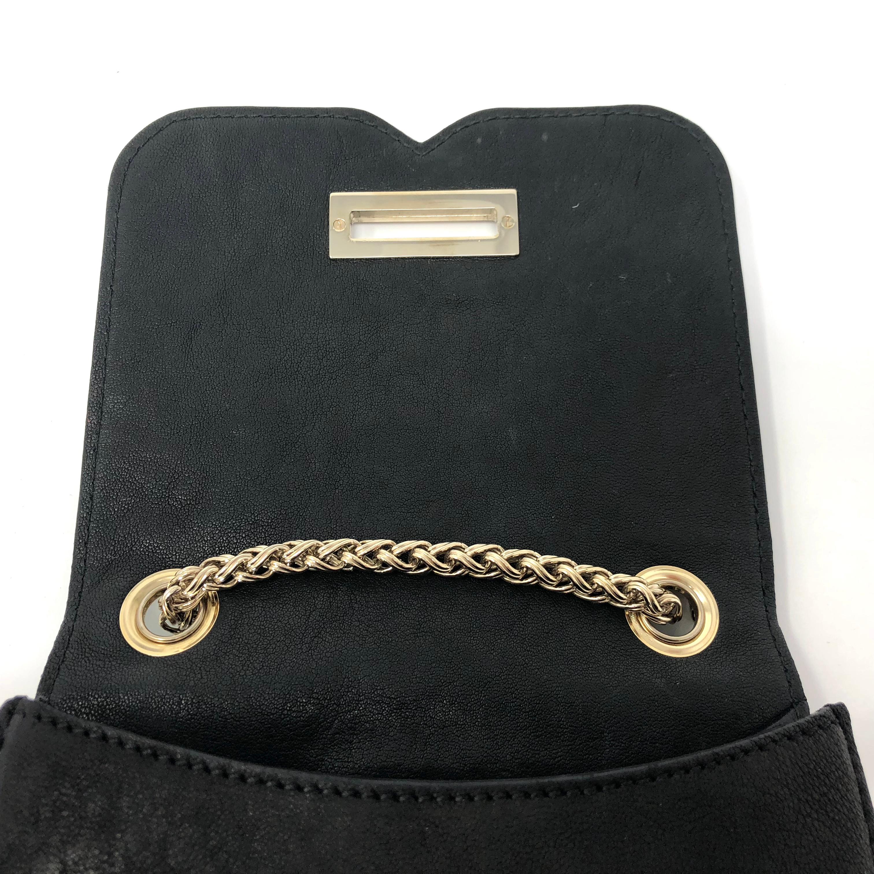 Balmain Ultimate Mini Umhängetasche aus schwarzem und weißem geprägtem Leder 1