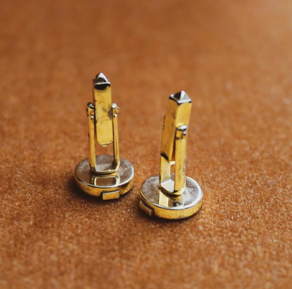 1970s Balmain Vintage Cufflinks
Get ready to upgrade your shirt game style with these Balmain vintage cufflinks from the 1970s, worthy of a James Bond-worthy entrance.
These cufflinks are in excellent condition and feature the Balmain stamp.
Born