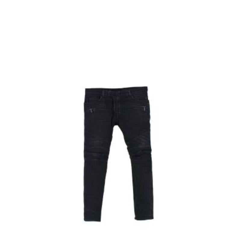Balmain Washed Black Denim Delve Seamed Jeans
 
 - Moto-style seamed skinny legs 
 - Sculpted zip tab fastening
 - 5 pocket cut, with 2 inset zip pockets on the thigh
 - Balmain logo patch back waistband
 
 Materials 
 98% Cotton 
 2% Polyester 
 
