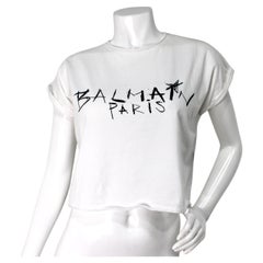 Maglietta cropped in cotone stile graffiti bianca e nera di Balmain